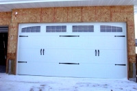 Haas-Sectional-Garage-Door-660-White-6-Pane-Single-Arch-Double-Hinges-and-Handles