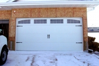 Haas-Sectional-Garage-Door-660-White-6-Pane-Single-Arch-Hinges-and-Handles
